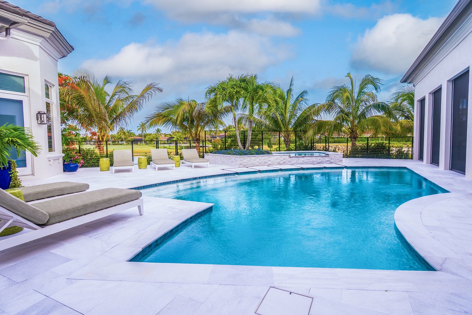 Waterfront deck view beside a luxury pool