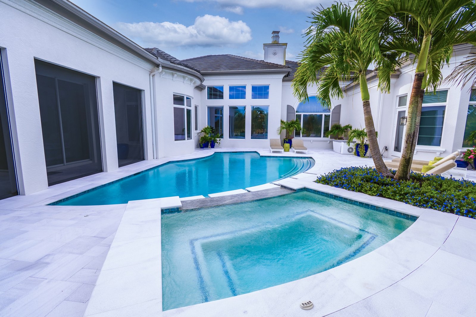Architectural poolside view with clean water and premium deck