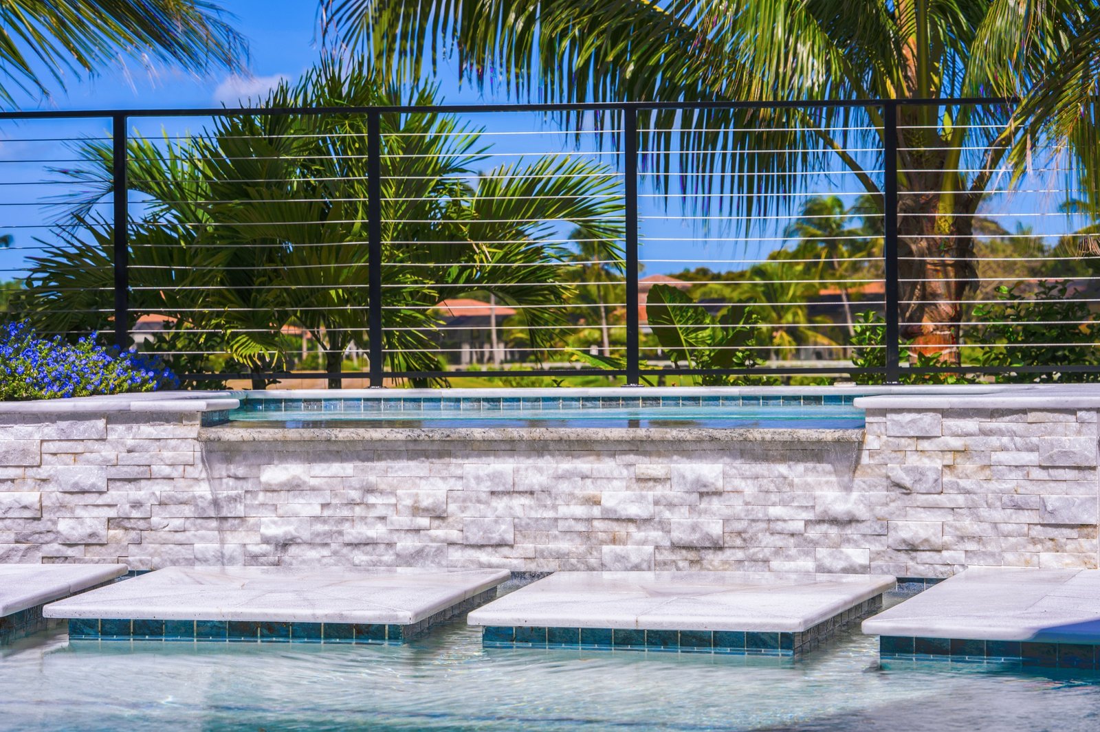 Modern pool edge and stone deck detail