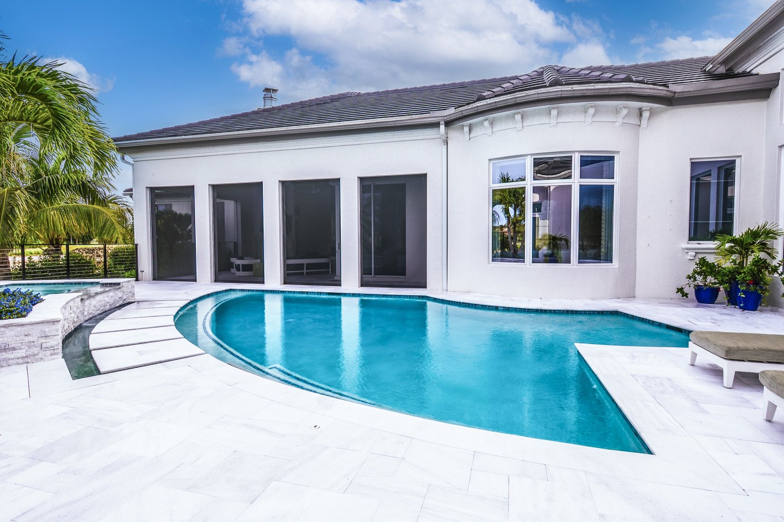 Estate patio and pool with outdoor living space